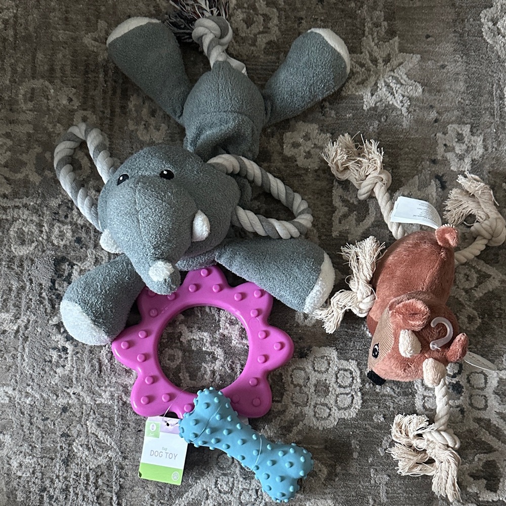 SET OF 4 DOG TOYS -NWT